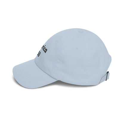 Light blue dad cap, side view with curved brim and adjustable back tabs