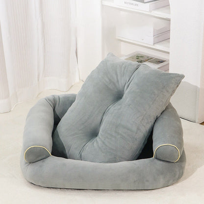 Gray pet sofa bed with cushioned base and supportive side bolsters, beige trim detail.
