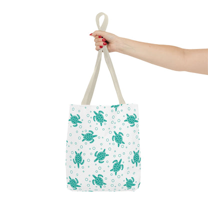 Sea turtle print tote bag with teal turtles on white, white carry handles