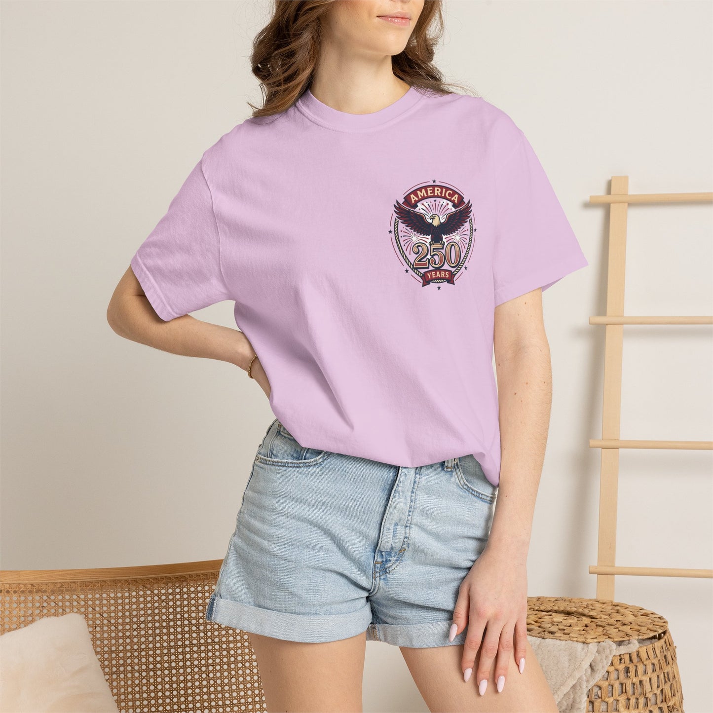 Lavender T-shirt with America 250 circular eagle logo on chest, short sleeves