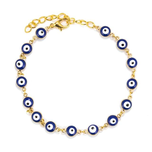 Charm bracelet with gold chain and linked blue evil-eye bead rows