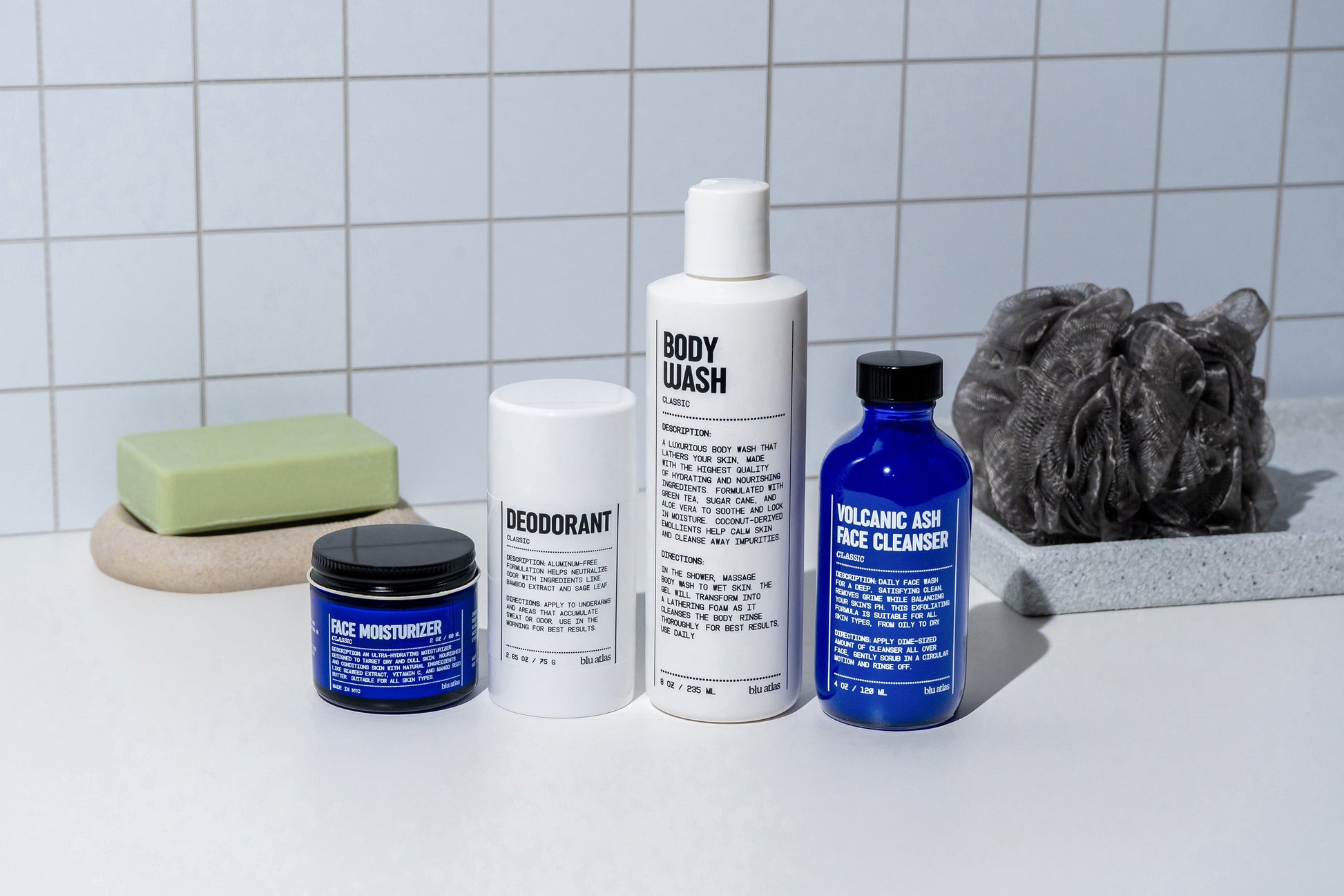 Skincare starter set with body wash bottle, deodorant, cleanser, face wash, and soap bar