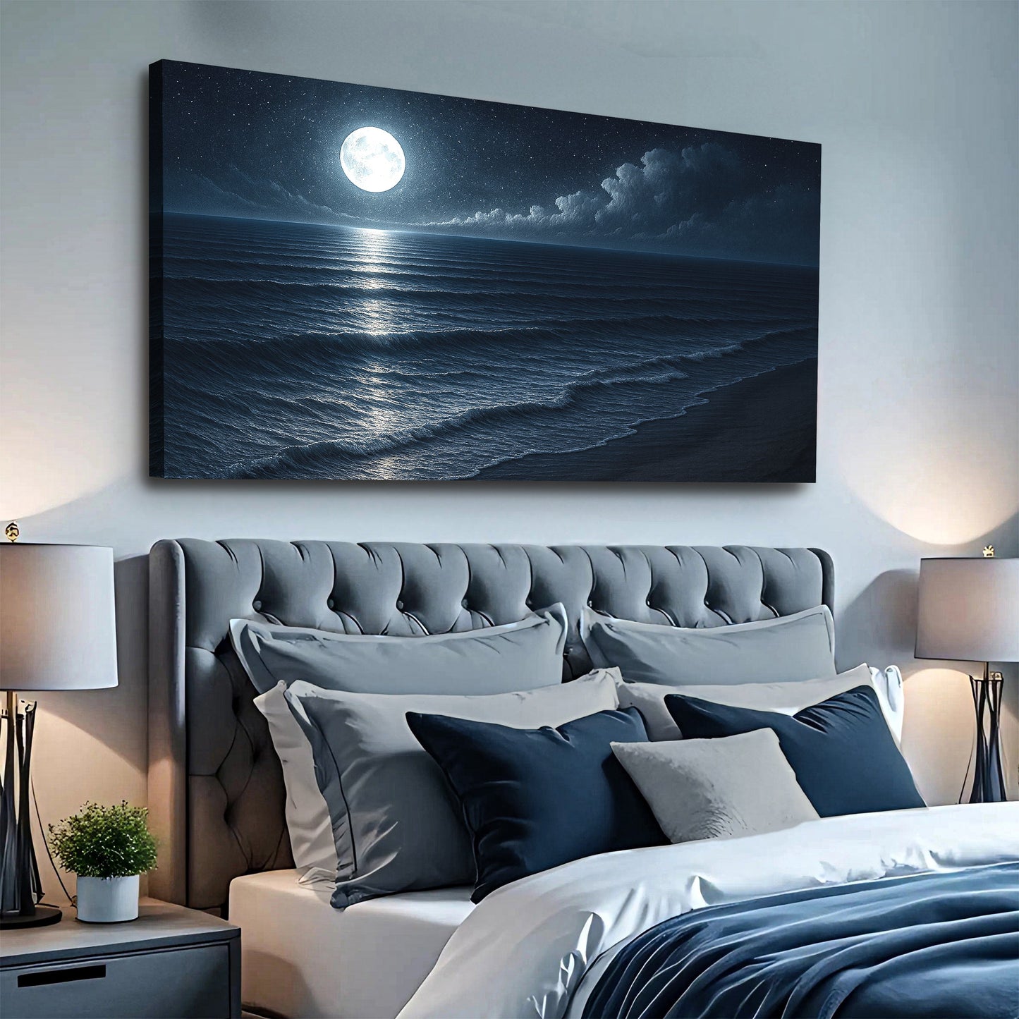 Coastal night seascape canvas wall art with moonlit shoreline above sofa