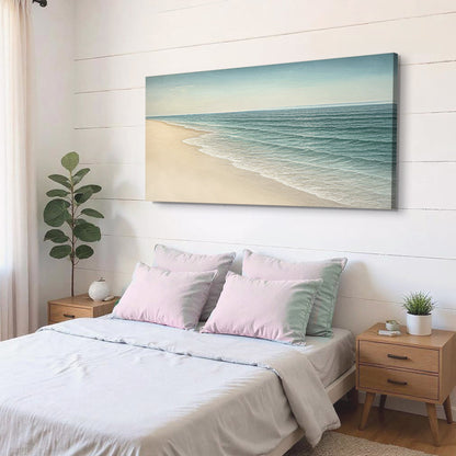 Beach shoreline canvas wall art with pale sand, foamy waves, and blue-green ocean water.