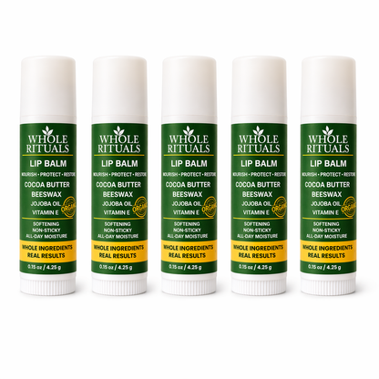 Whole Rituals lip balm sticks, five white tubes with green labels