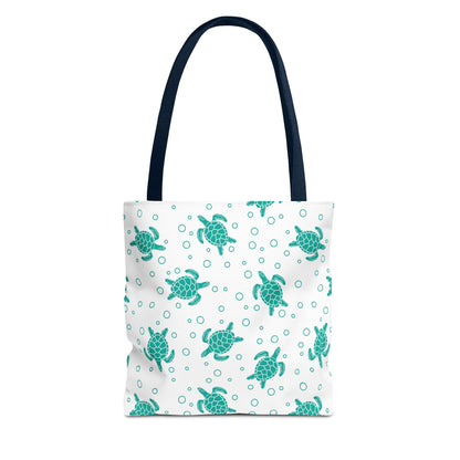 Sea turtle pattern tote bag with teal turtles on white background and navy handles