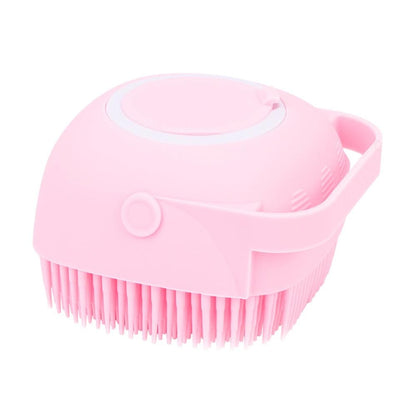 Pink dog bath brush with soft bristles and circular top opening