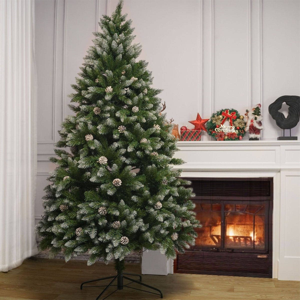 Artificial Christmas tree with snow-dusted green needles and pinecones, on stand