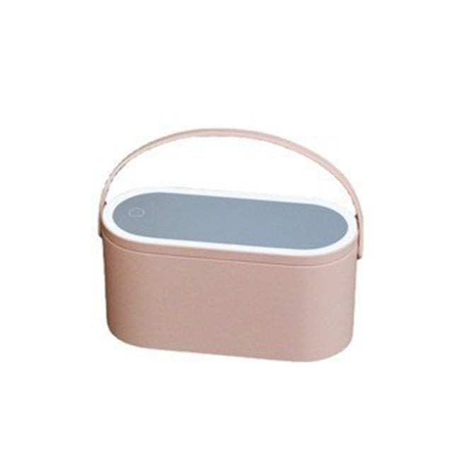 Beige makeup organizer box with arched handle and oval top lid, compact storage
