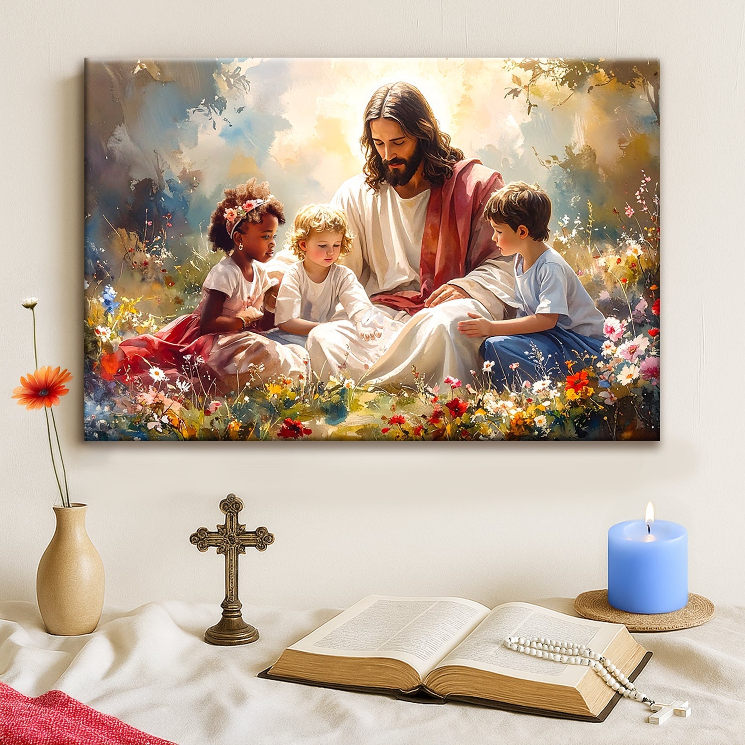 Framed Jesus with children wall art above a cross, book, and candle