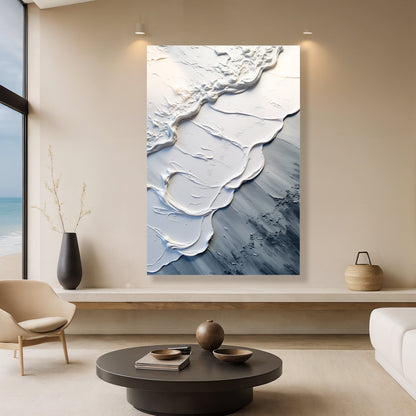 Abstract wave wall art featuring raised white waves over blue-gray textured surface