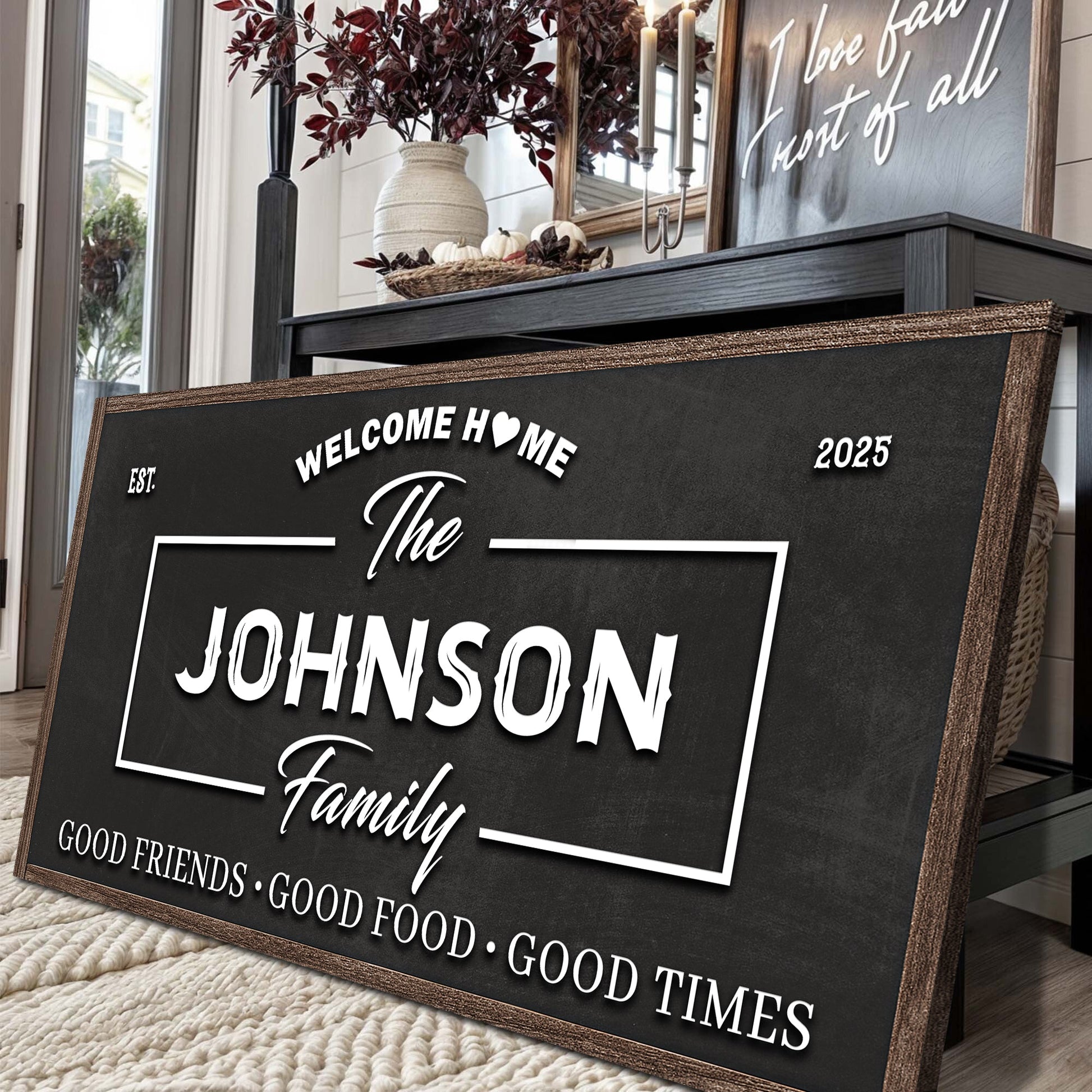 Large freestanding wall sign in a dark frame with “The Johnson Family” lettering and border