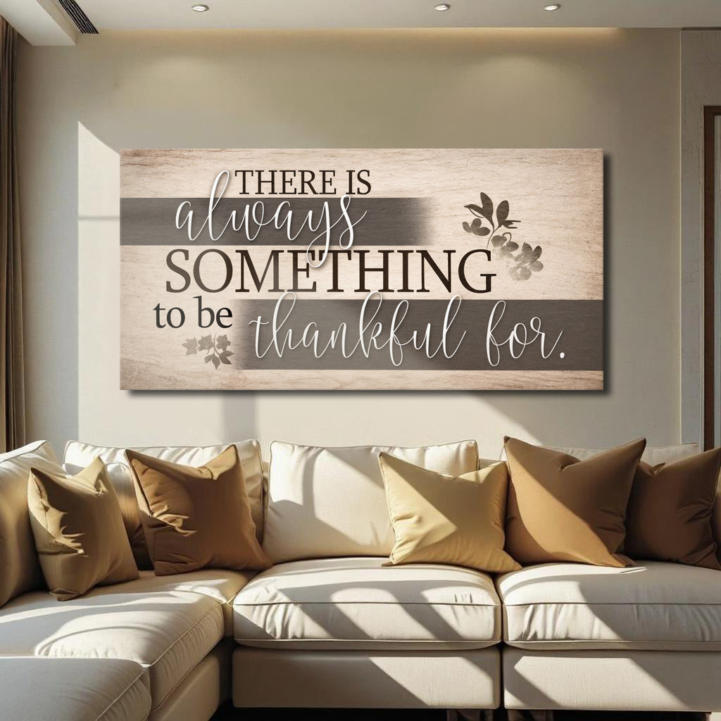Landscape wall sign with beige and dark gray stripes, reading “There is always something to be thankful for.”