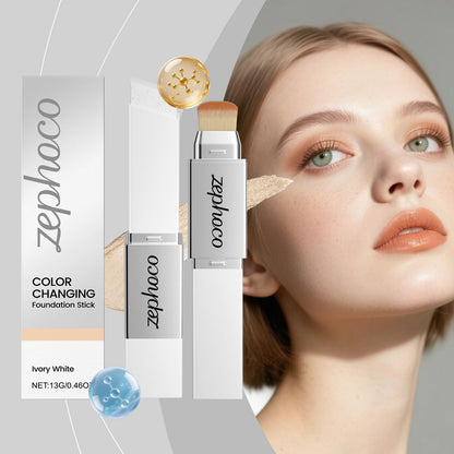 Ivory white color-changing foundation stick with brush applicator on face