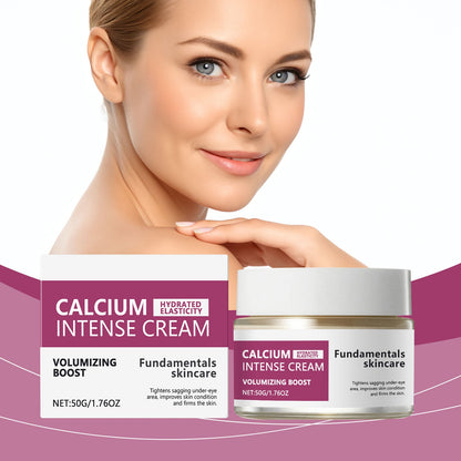 Moisturizing cream jar with gold lid and matching box beside a woman’s cheek.