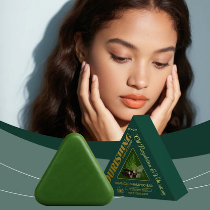 Green triangle shampoo bar with herbal label, close-up foreground