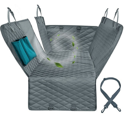 Grey quilted dog car seat cover with side handles and front tie strap
