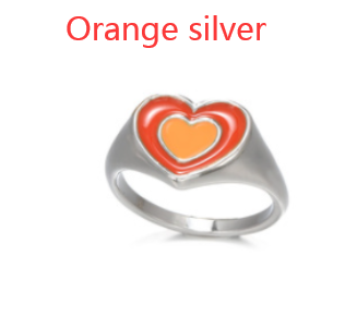 Heart ring with orange enamel heart design on silver-tone band