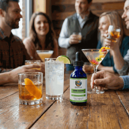 Liver Guard supplement bottle on table in drinks setting, dark blue glass with green label