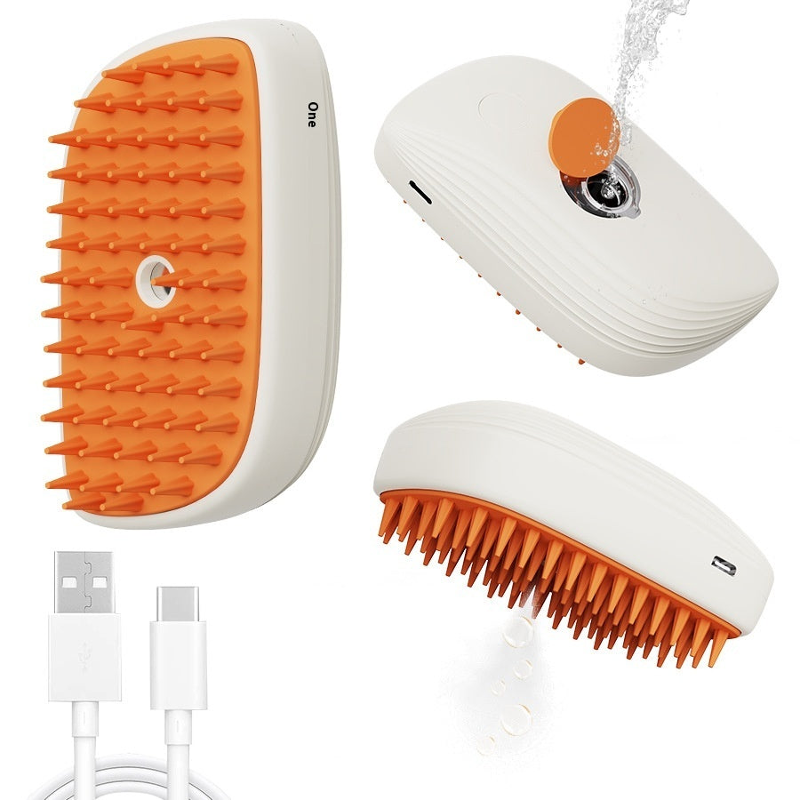 Pet grooming steam brush with orange bristle pad, white housing, and USB cables