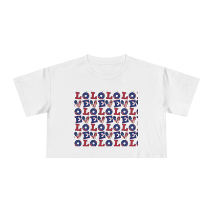 White graphic crop tee with multicolor “LOL” block print