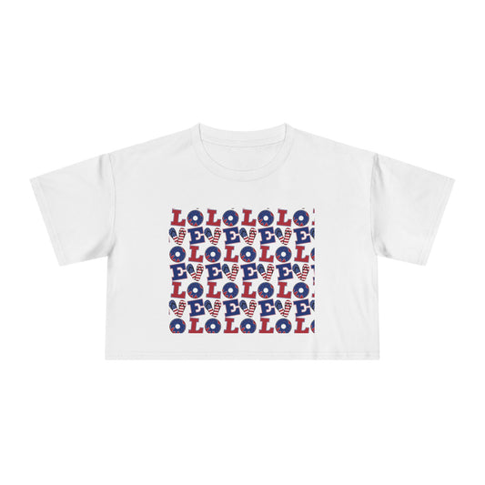 White graphic crop tee with multicolor “LOL” block print