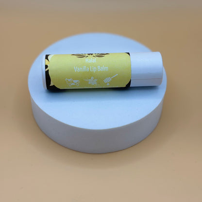 Halal tallow lip balm stick labeled Vanilla in green tube with white cap