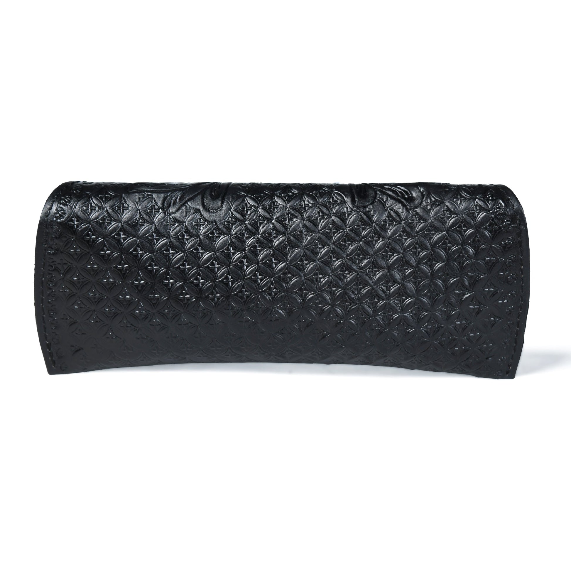 Black textured leather sunglasses cover with embossed diamond pattern, rolled cylinder shape