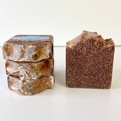 Sea salt soap bars, stacked cube and single brown speckled bar on side