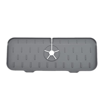 Light grey kitchen faucet mat with raised drip nubs and circular drain center