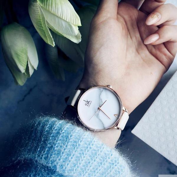 Shengke women's fashion watch with white dial, white strap, rose-gold case