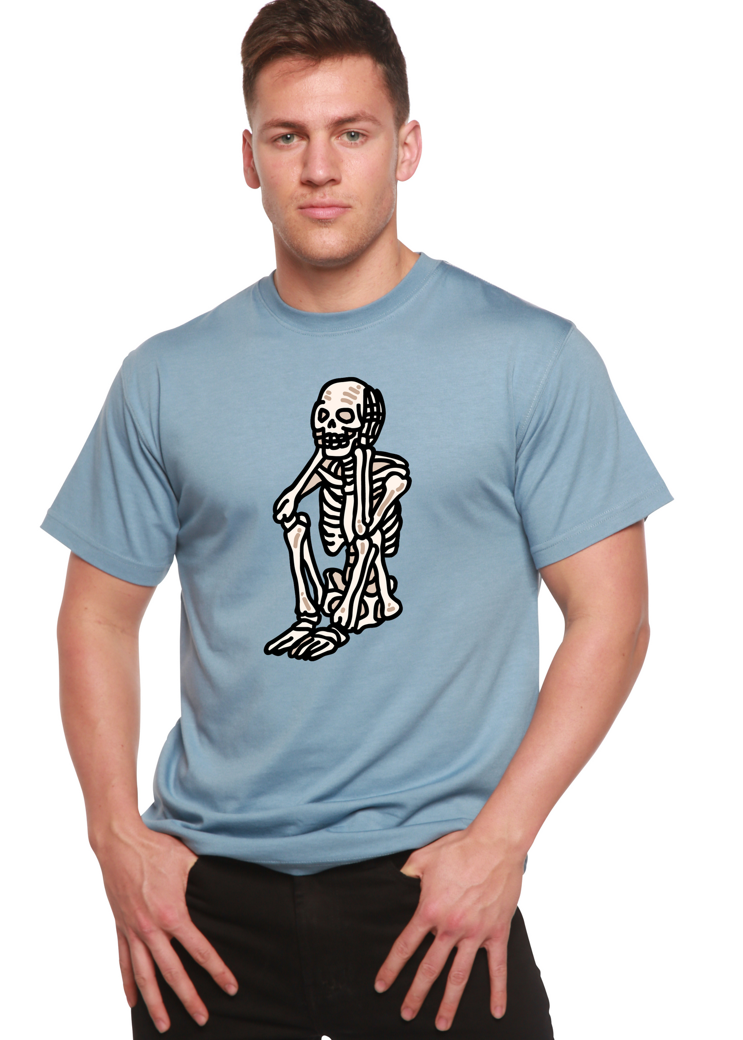 Light blue unisex graphic T-shirt with white skeleton standing print on chest.