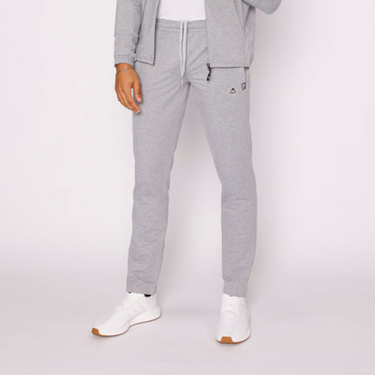 Light gray tapered sweatpants with zip pocket and drawstring waistband