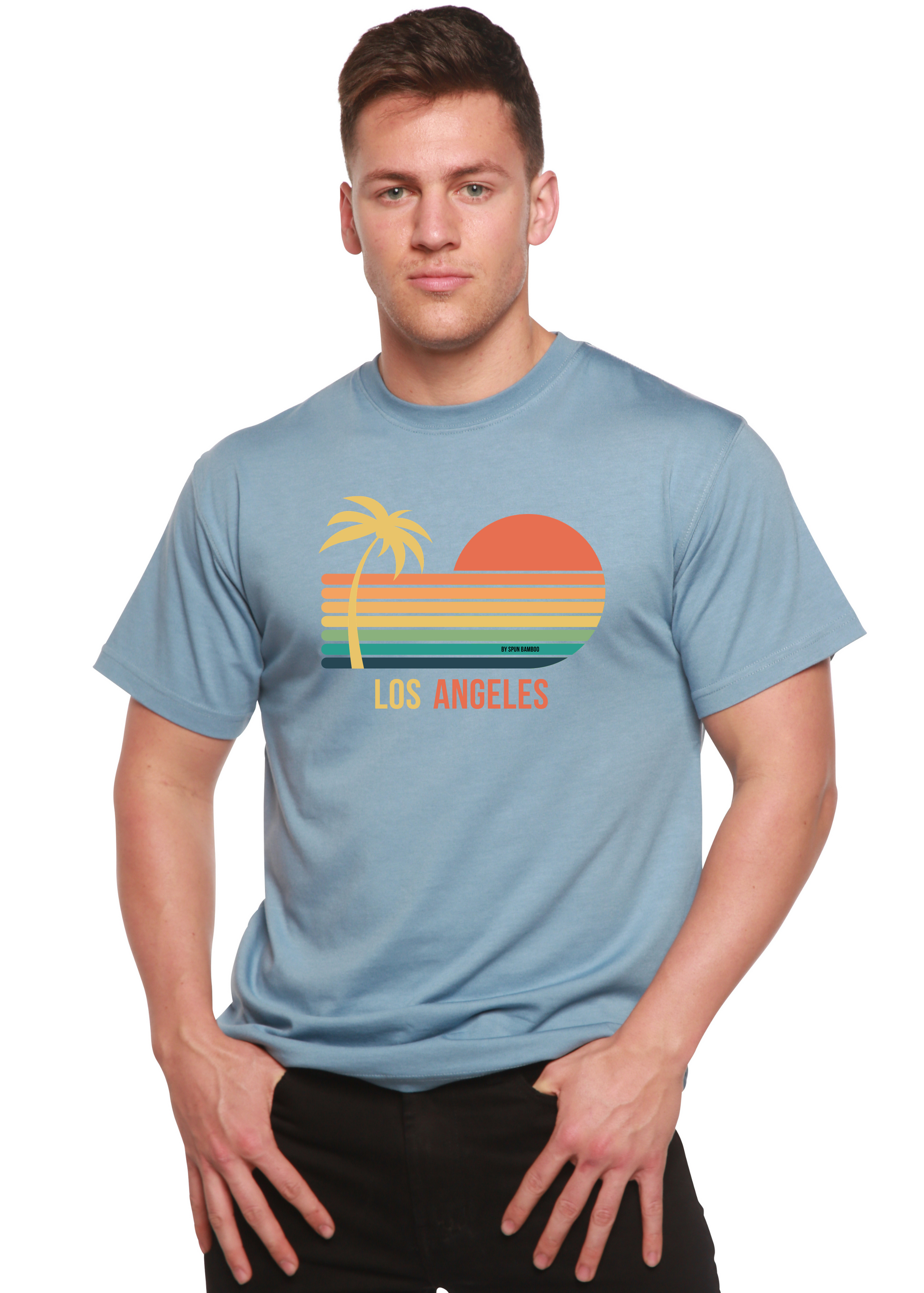 Unisex graphic T-shirt in light blue, palm-sunset print with 'Los Angeles' text