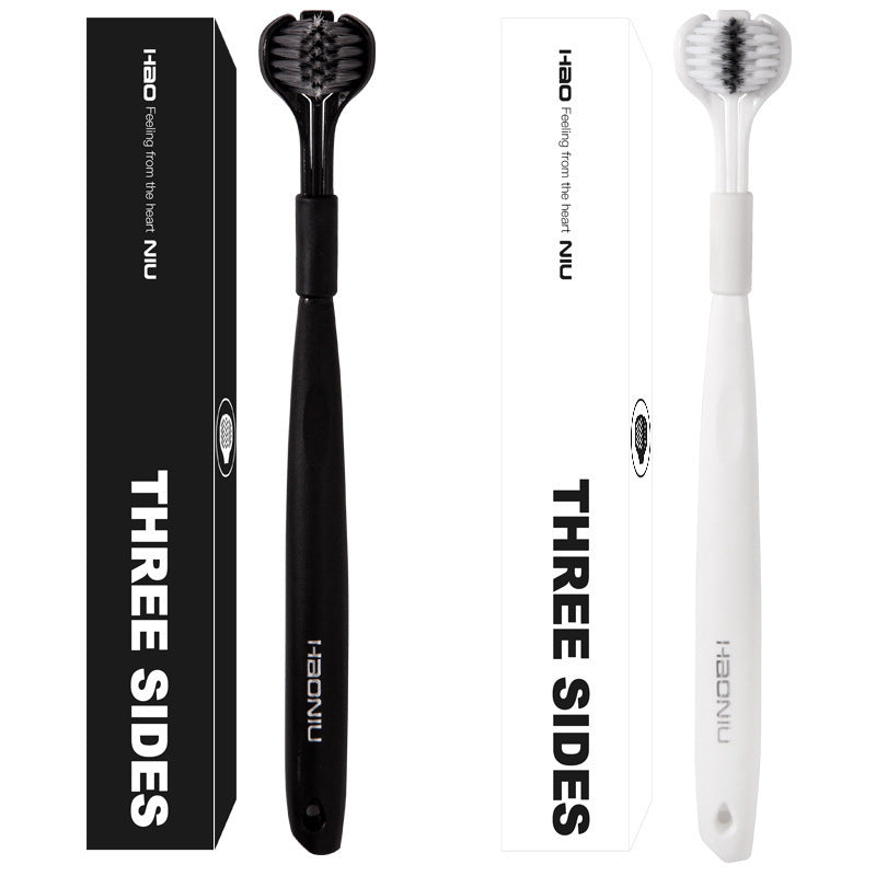 Triple-sided soft bristle toothbrushes in black and white boxes with handles