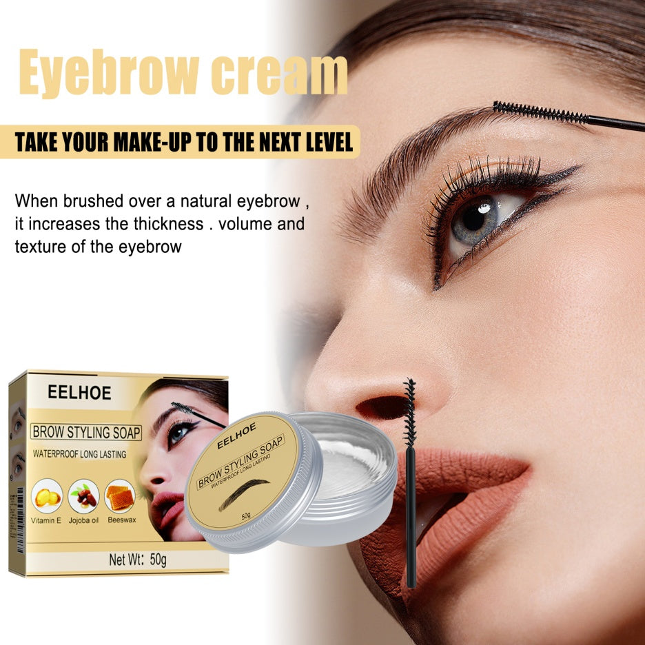 Eyebrow styling gel jar with spoolie brush, for shaping natural brows near the eye.