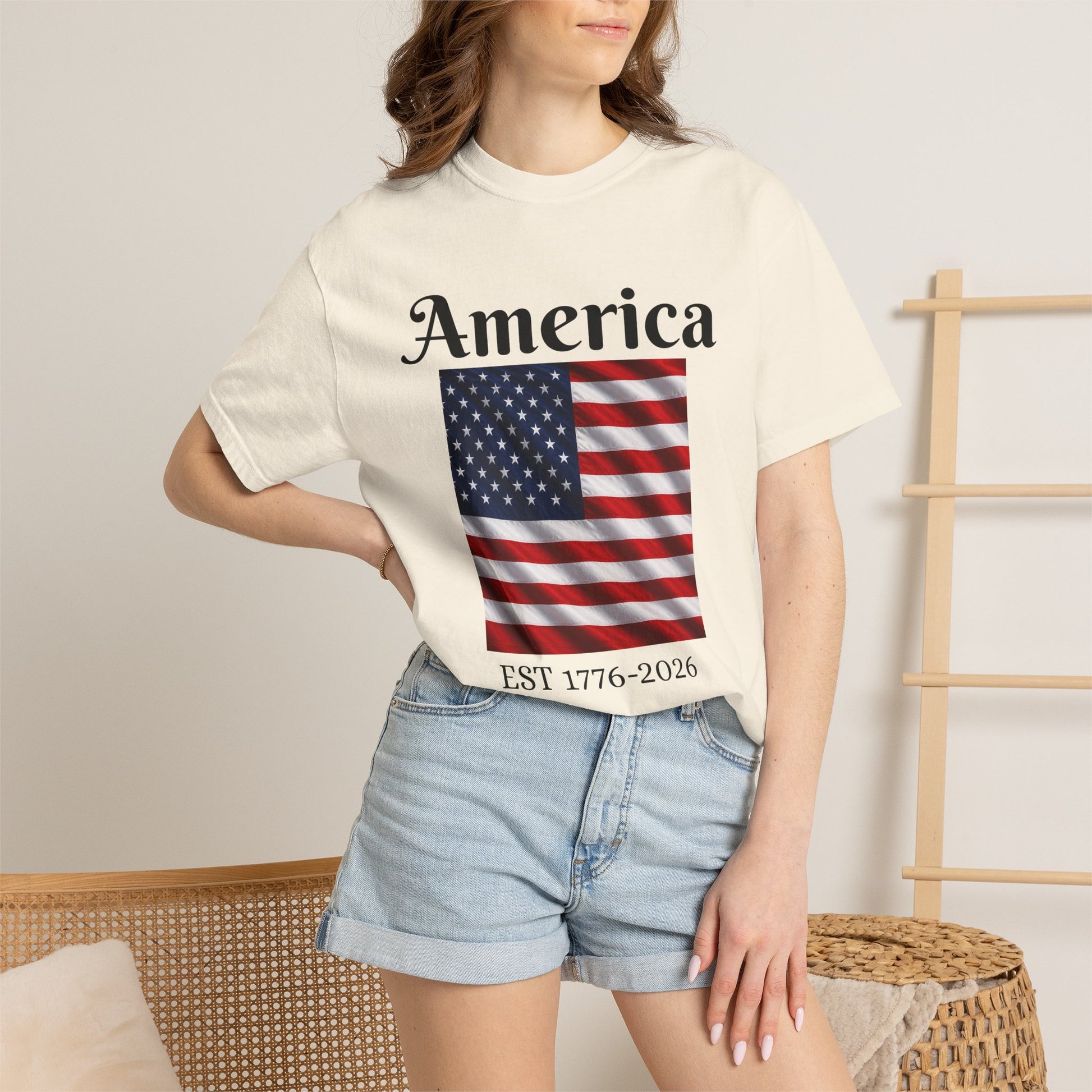 White T-shirt with America script over flag and 'EST 1776-2026' text