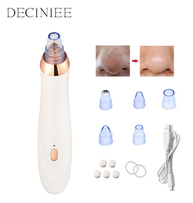 White electric pore cleaner with suction head and included attachment tips