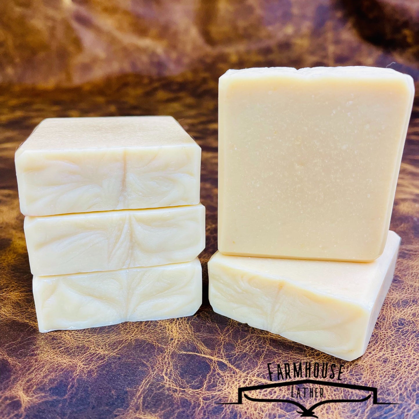 Unscented soap bar set: pale cream blocks stacked on dark surface