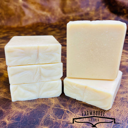 Unscented soap bar set: pale cream blocks stacked on dark surface