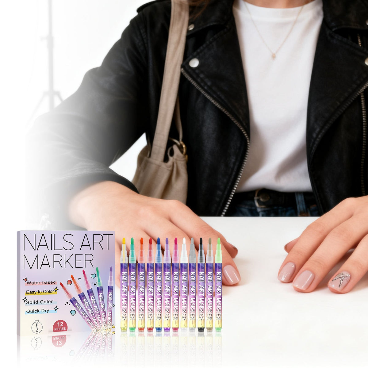 Nail art marker set with 12 colorful pens and display box, used on fingernails