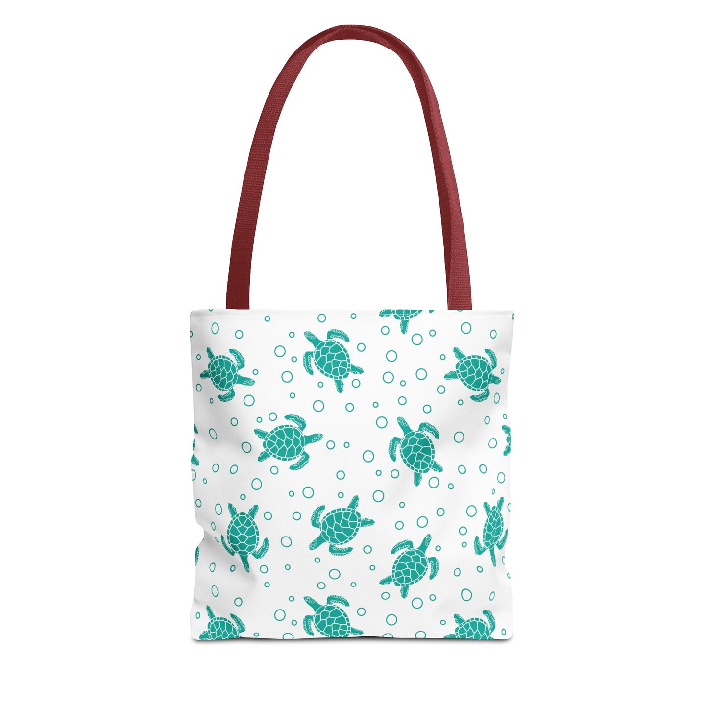 Sea turtle pattern tote bag with teal turtles on white background and red handles