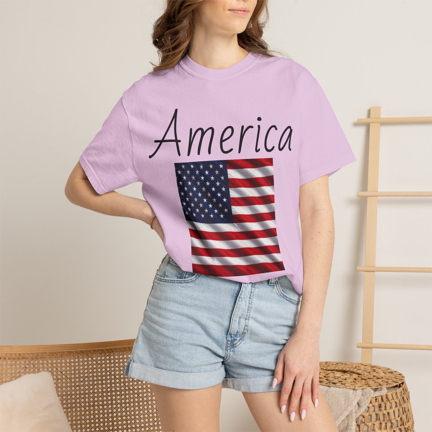 Purple unisex T-shirt with 'America' script and US flag graphic on front, crew neck