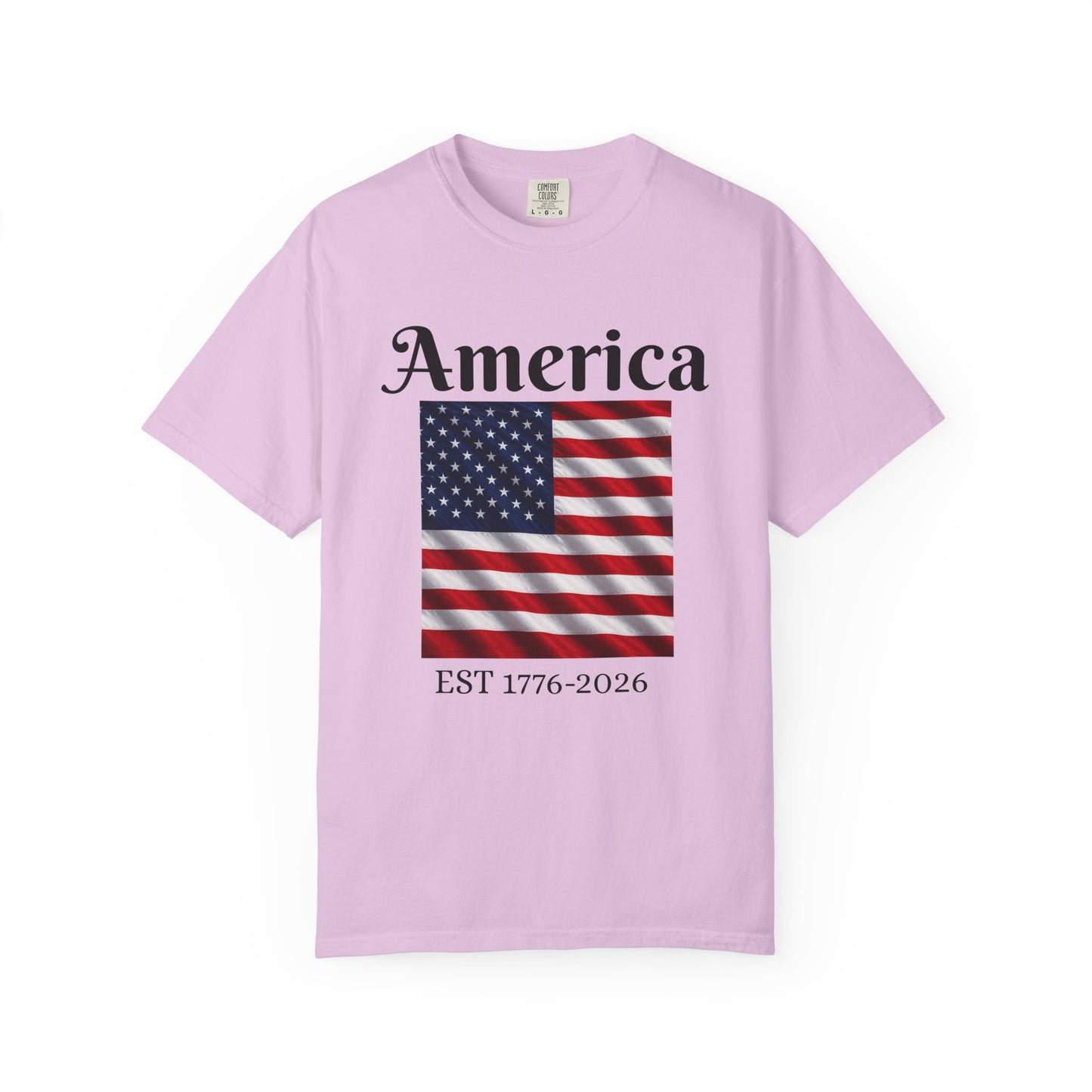 Light purple crewneck T-shirt with "America" text, American flag, and EST 1776-2026