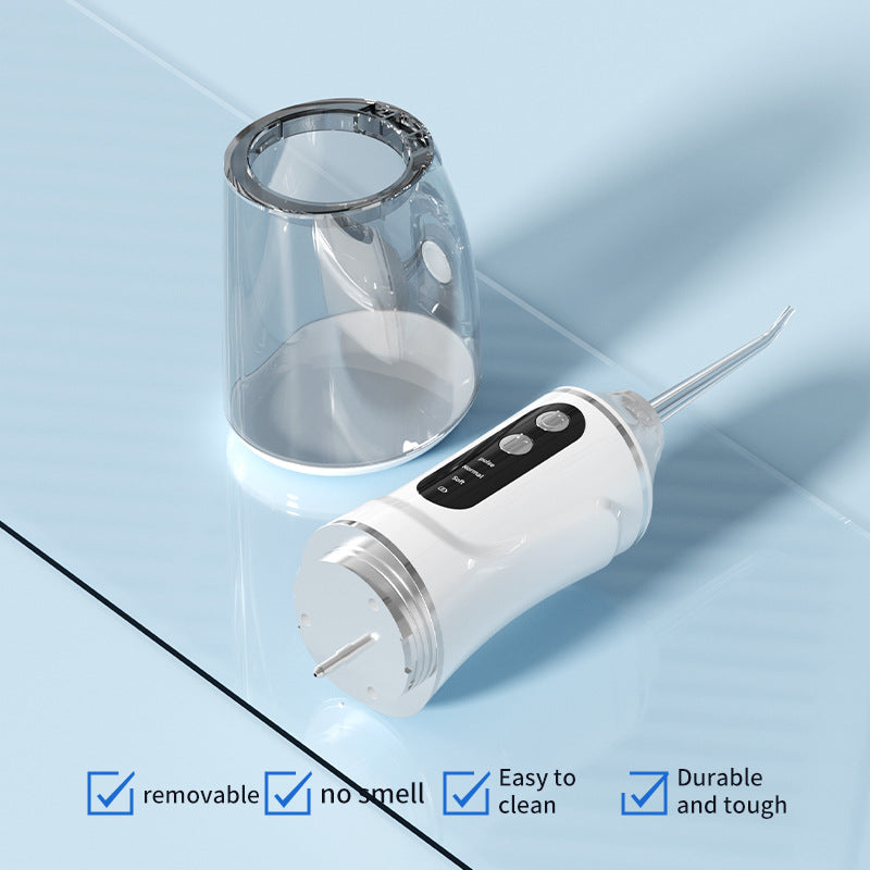 Portable electric dental flosser with clear water reservoir and white handle