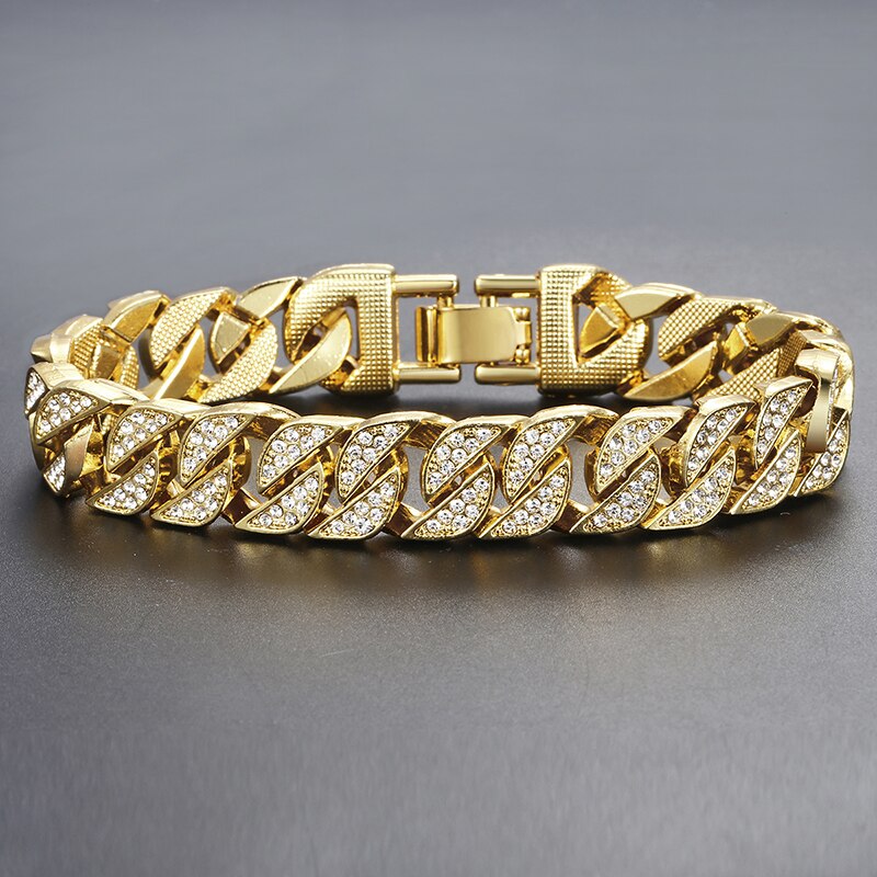 Gold curb Cuban bracelet with marquise stone links and gold clasp