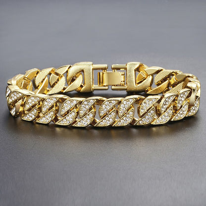 Gold curb Cuban bracelet with marquise stone links and gold clasp