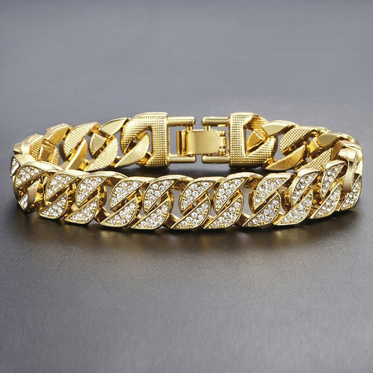Gold curb Cuban bracelet with marquise stone links and gold clasp