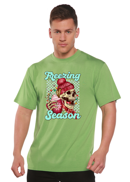 Unisex short sleeve graphic T-shirt, green, skull with “Freezing Season” text.
