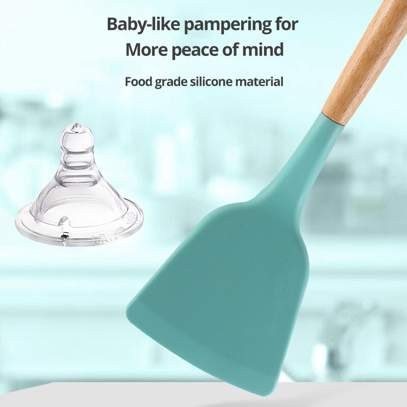 Teal silicone spatula with a wooden handle for cooking and stirring